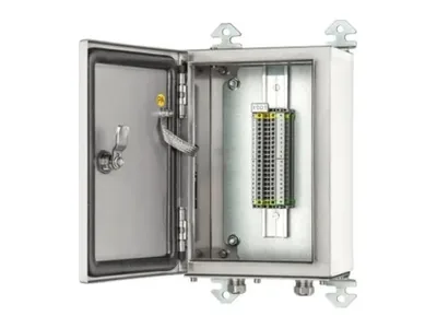 Exe terminal box with the door open, showing DIN-rail terminal blocks