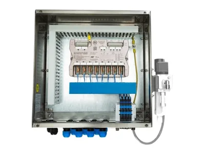 Ex valve bank panel with a valve manifold and terminals in an open stainless steel enclosure